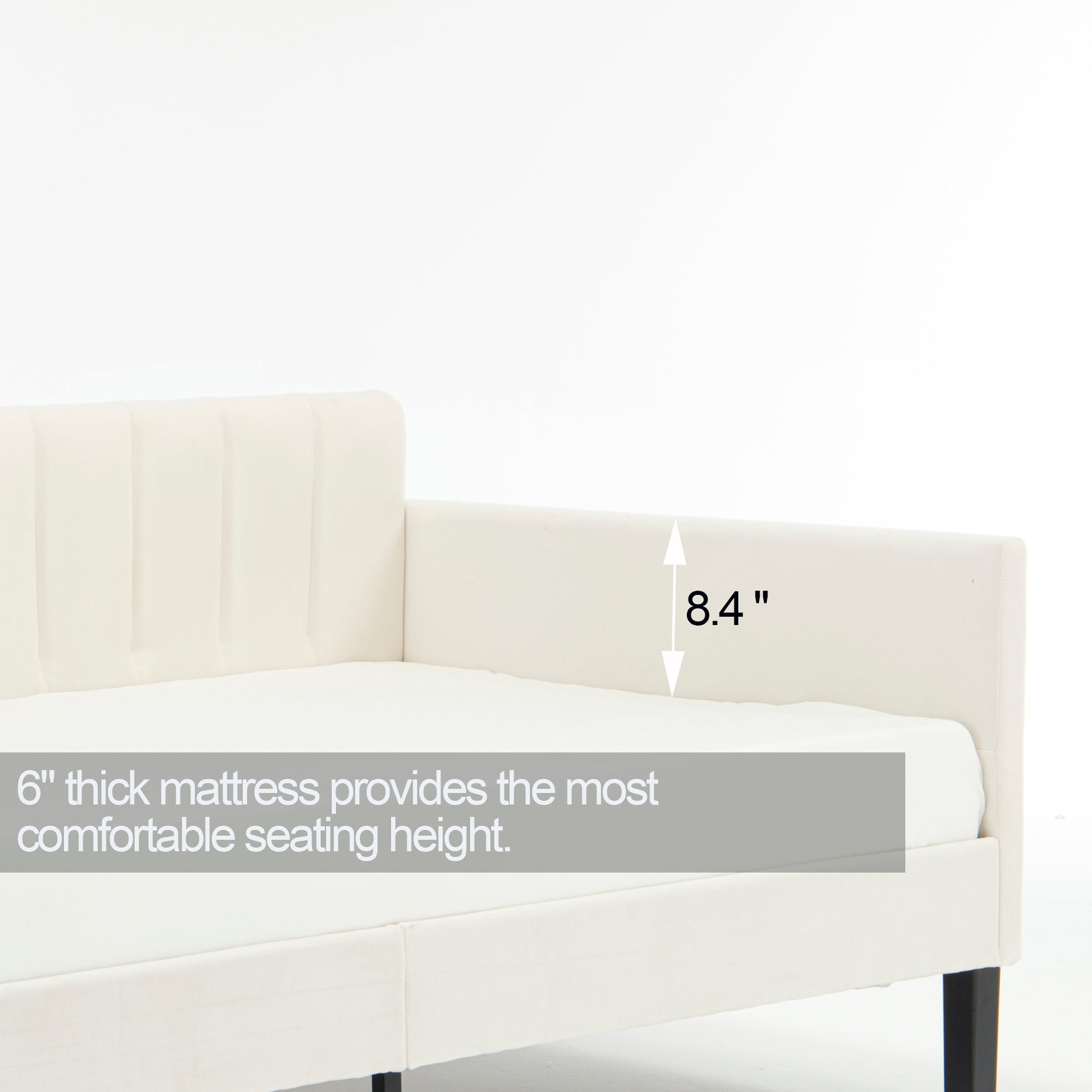 Cream upholstered daybed with channel tufting