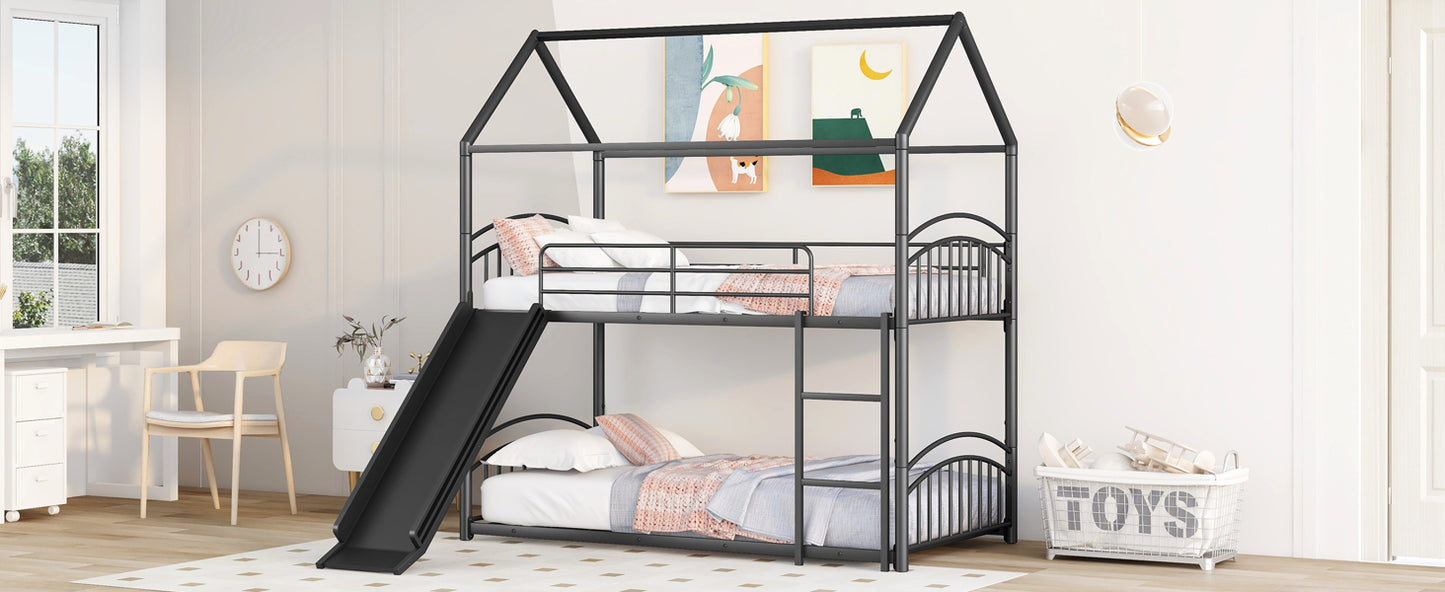 Black metal twin over twin bunk bed with attached slide and houseshaped frame