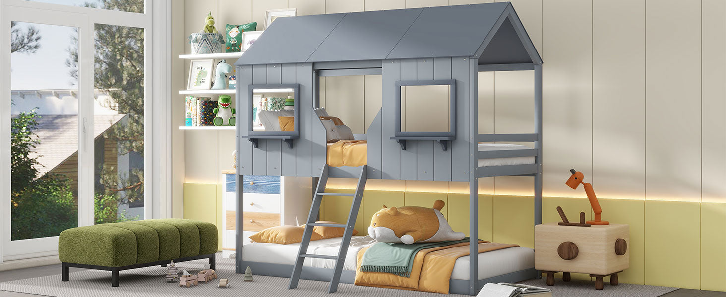 Gray wooden twin over twin bunk bed with houseshaped top and ladder