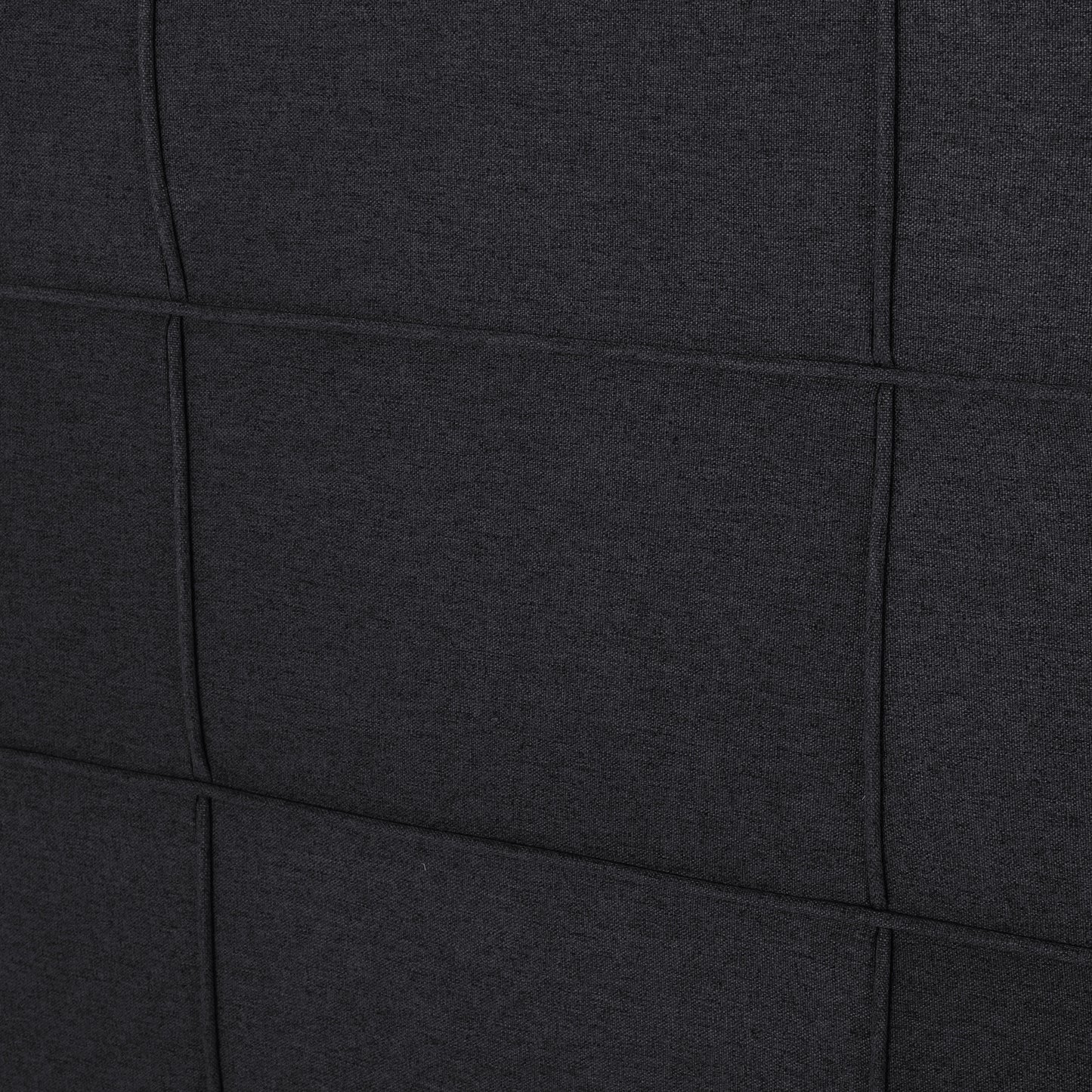 Closeup of dark grey linen fabric texture with stitched panel detail