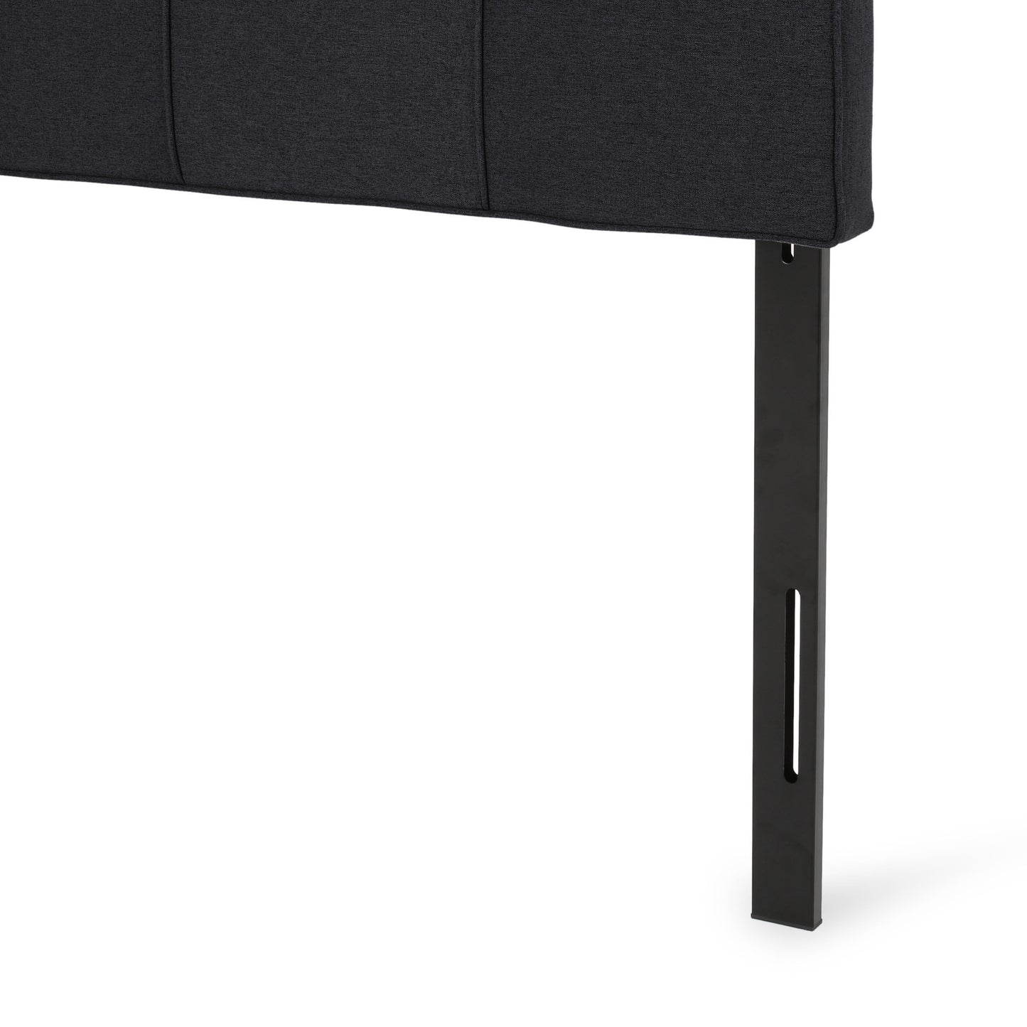 Dark gray upholstered headboard with square stitching and black metal legs