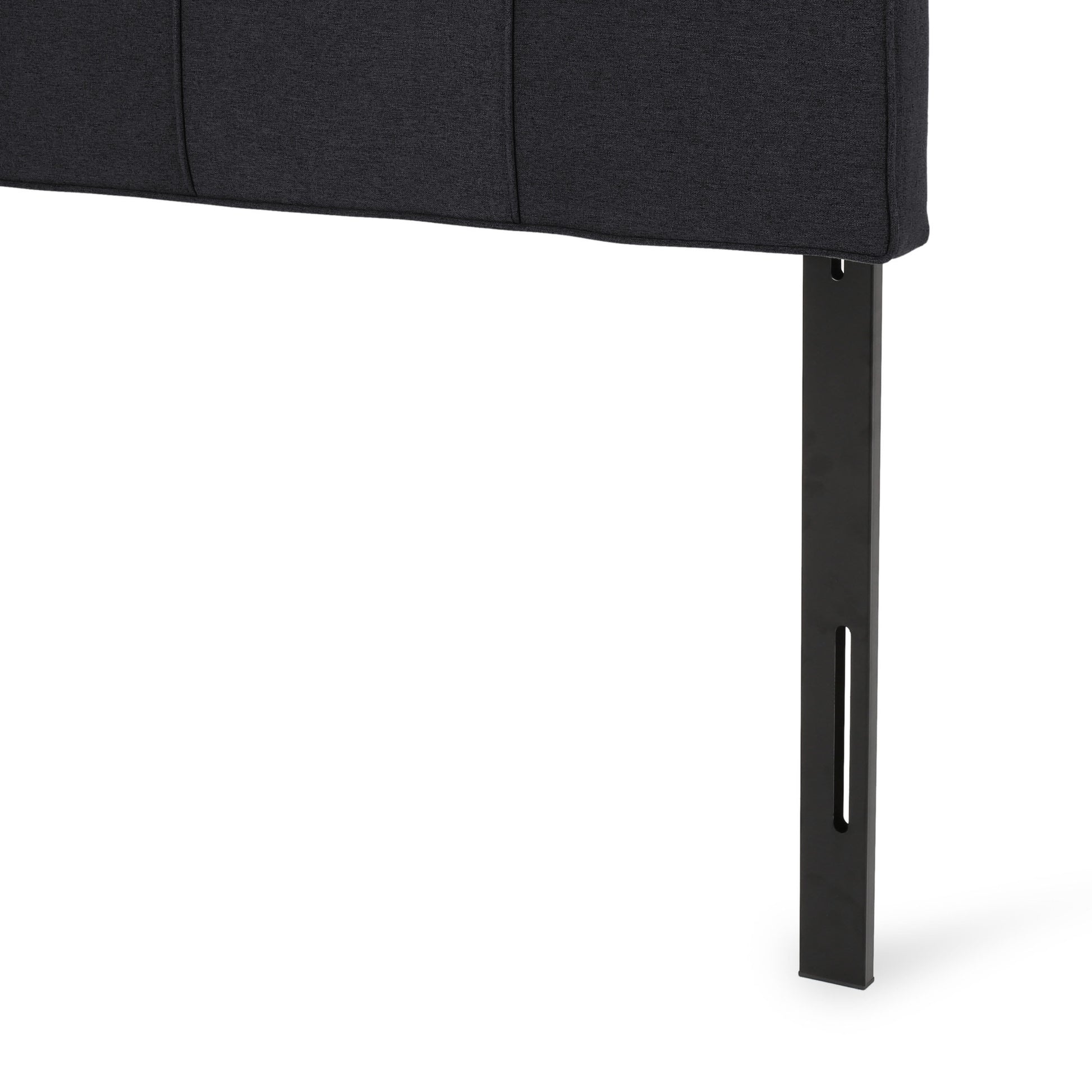Dark gray upholstered headboard with square stitching and black metal legs
