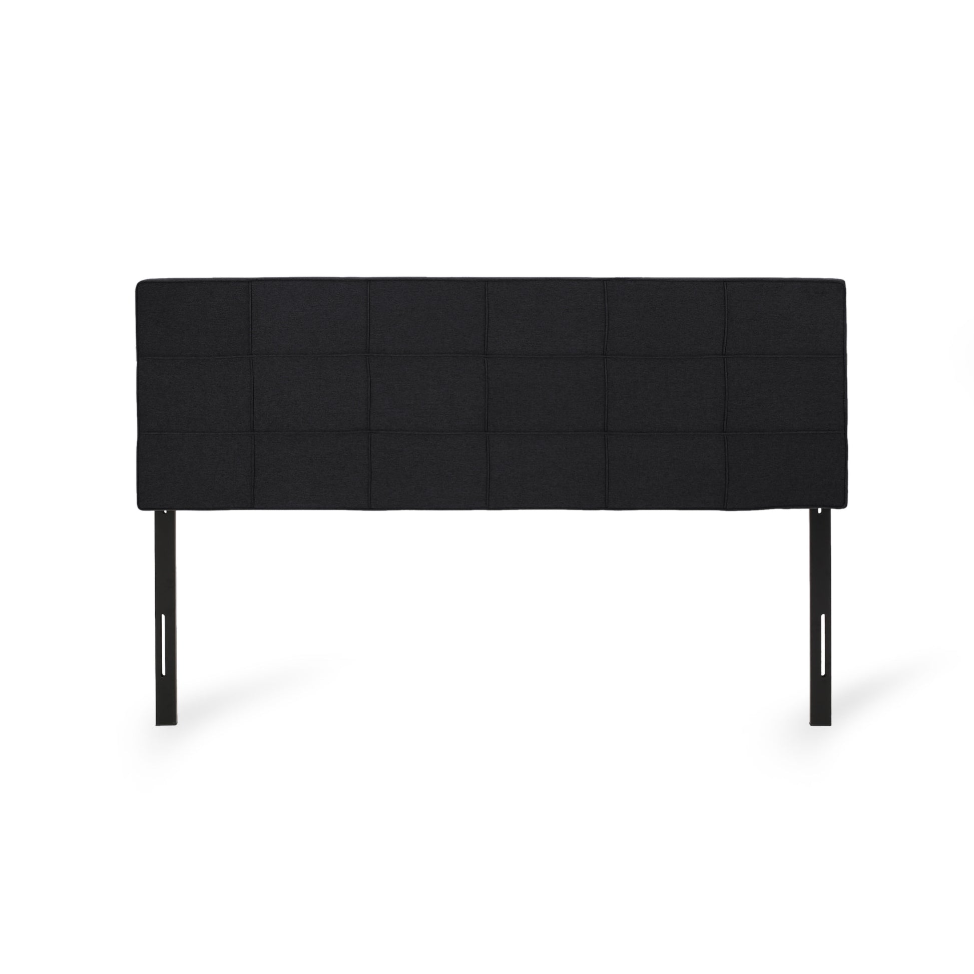 Black upholstered headboard with squared tufting and metal legs