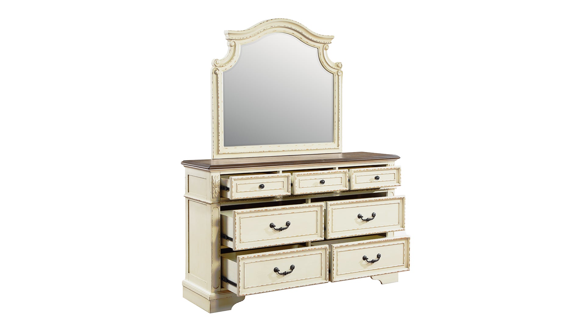Creamy white antique dresser with ornate carved details and a large arched mirror
