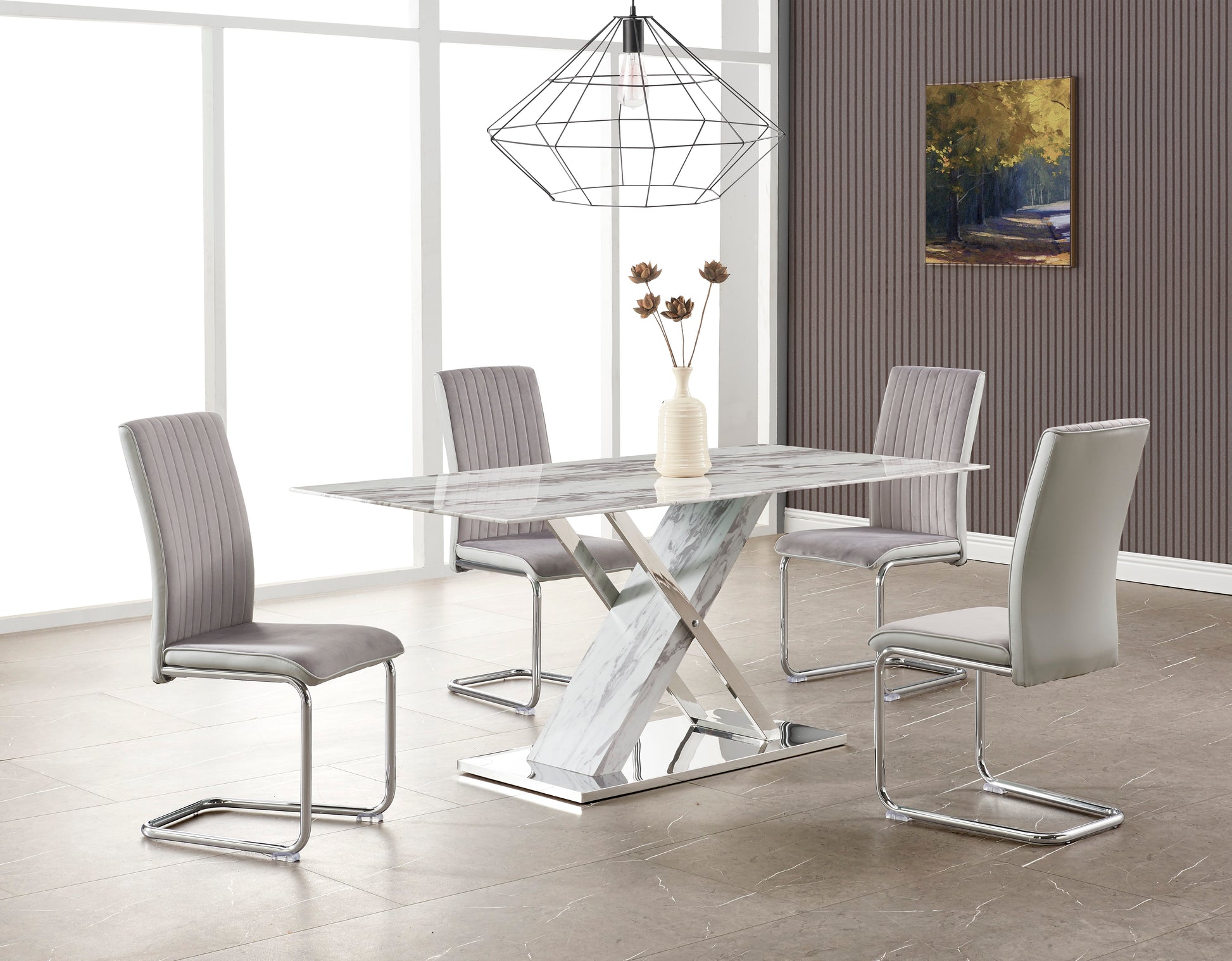 Modern marble dining table with chrome legs and grey upholstered chairs