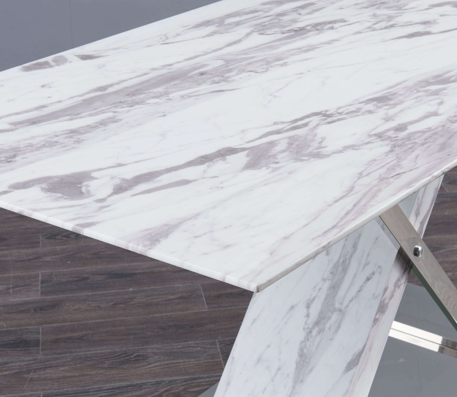Modern white marble dining table with chrome pedestal base