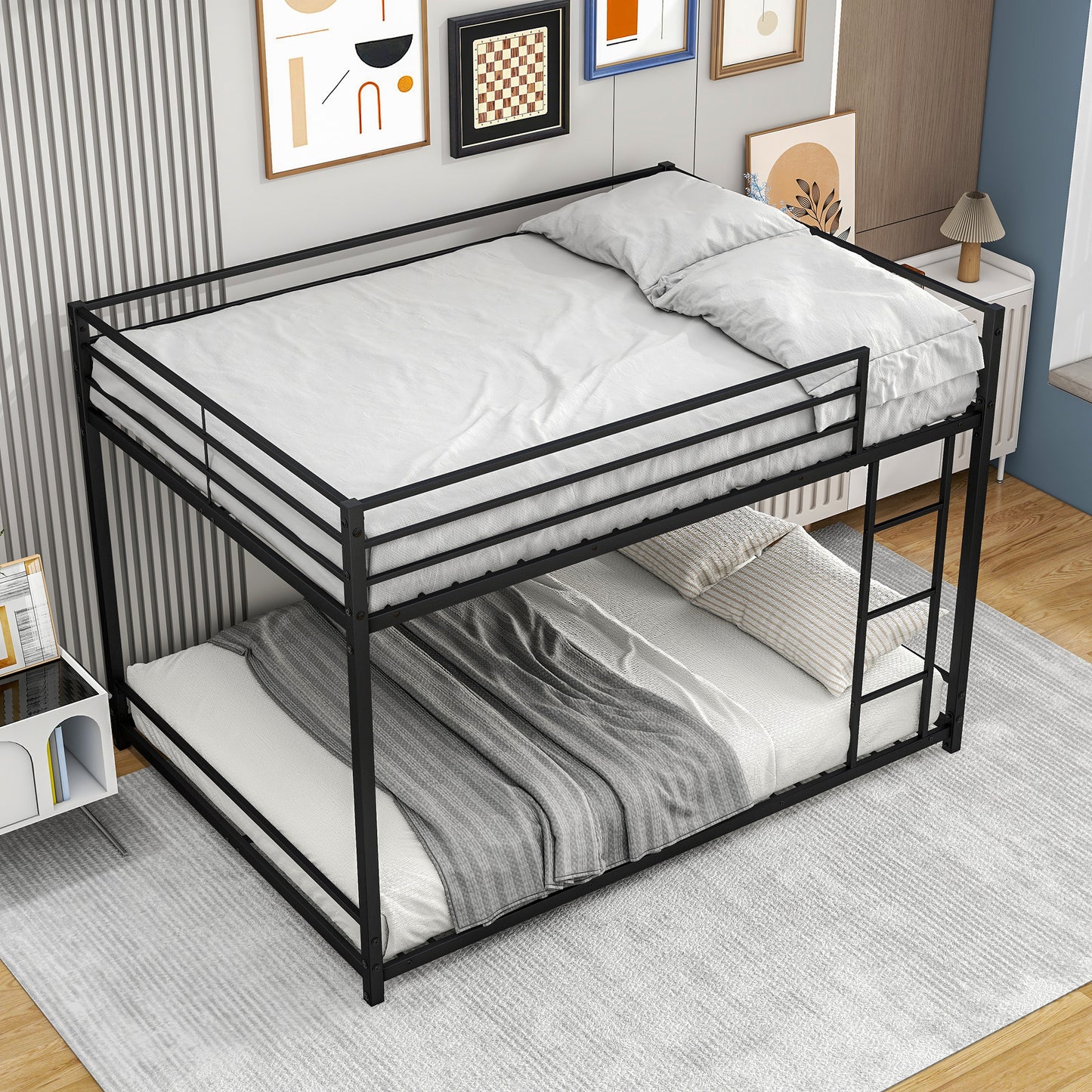 Black metal bunk bed with two twin size mattresses and white bedding