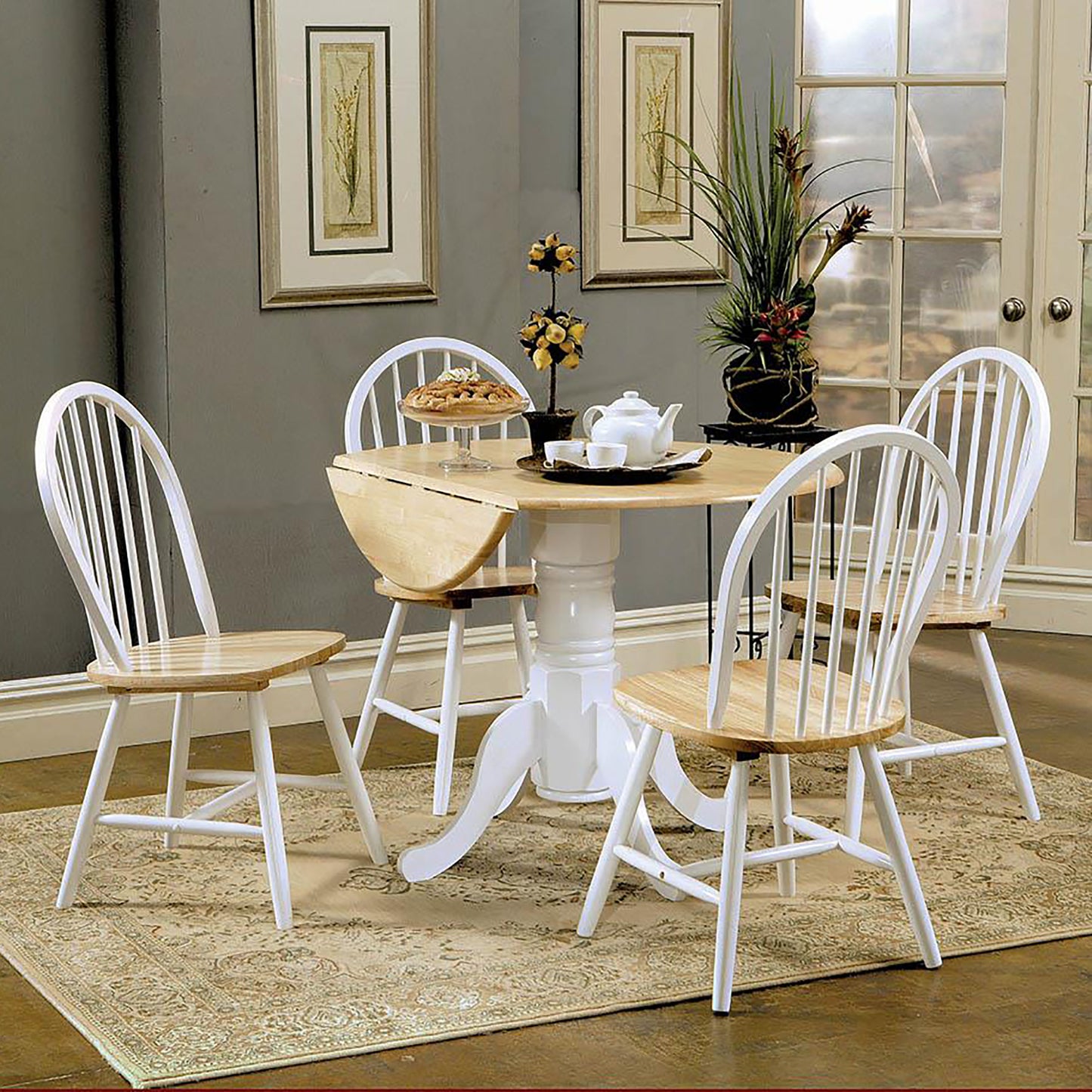 White spindle back dining chairs with natural wood seats