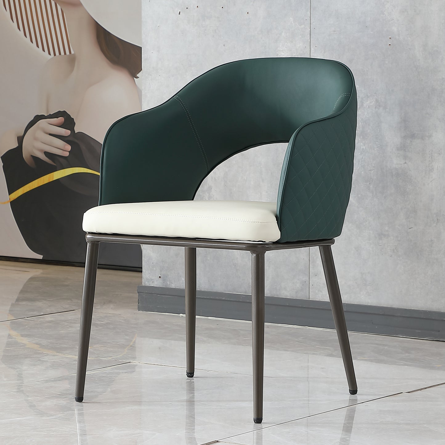Dark green upholstered modern accent chair with white seat cushion and metal legs