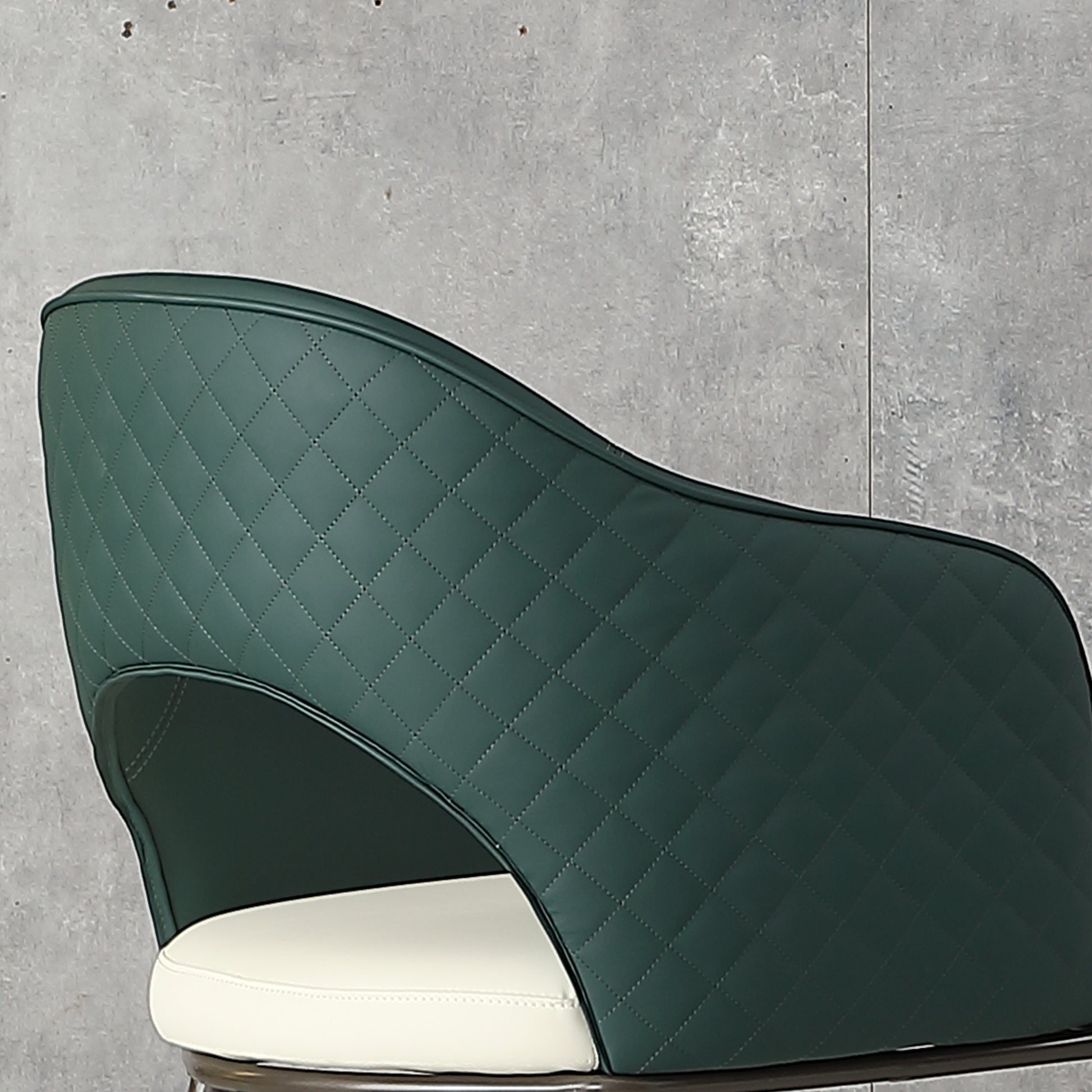 Emerald green quilted leather accent chair with white cushion
