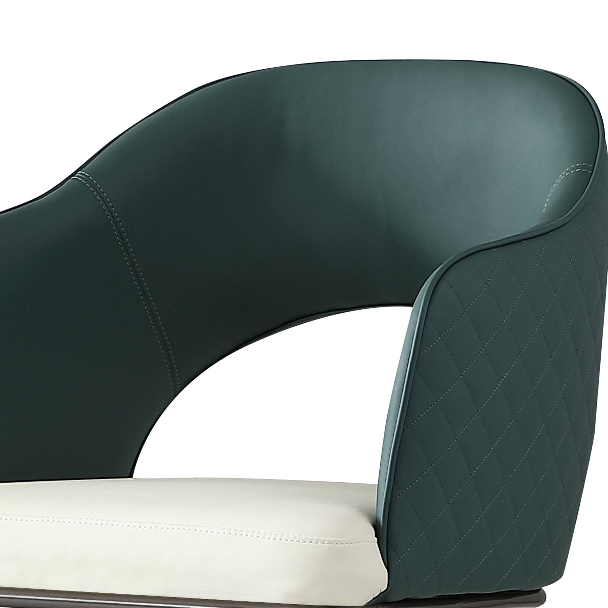 Dark green armchair with diamond quilting and white seat cushion
