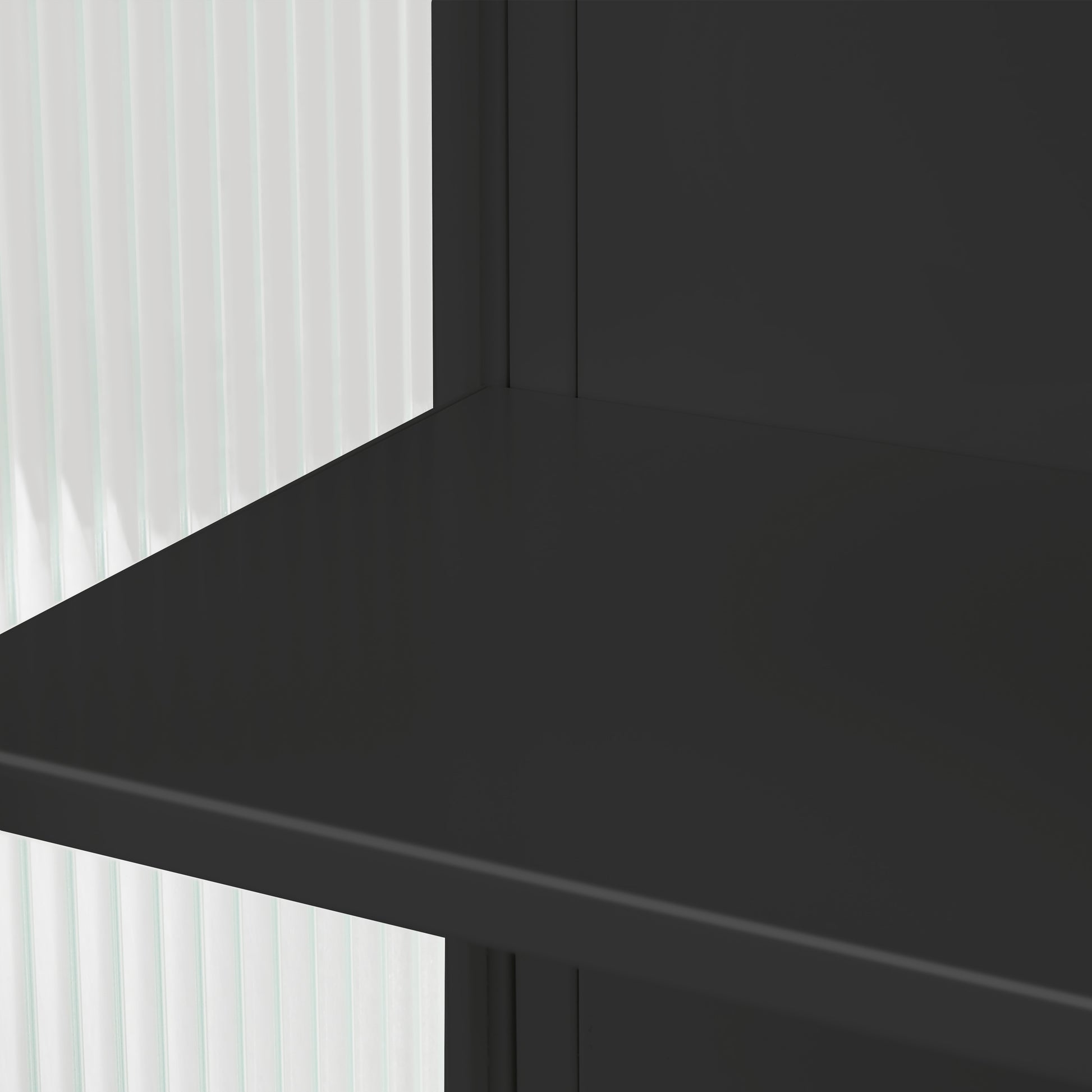 Black metal shelf with clean lines and a matte finish