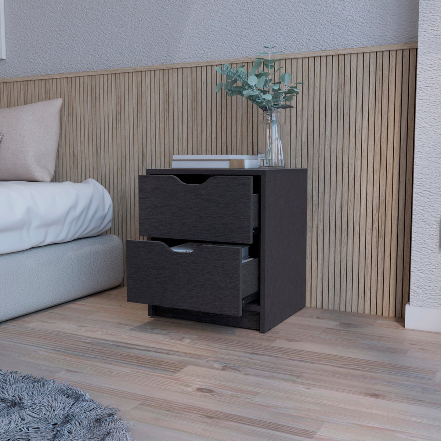 Dark charcoal wood nightstand with two drawers open on the left adjacent to bed