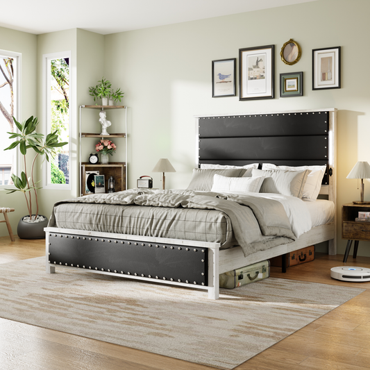 Black upholstered panel bed with riveted white frame and neutral bedding