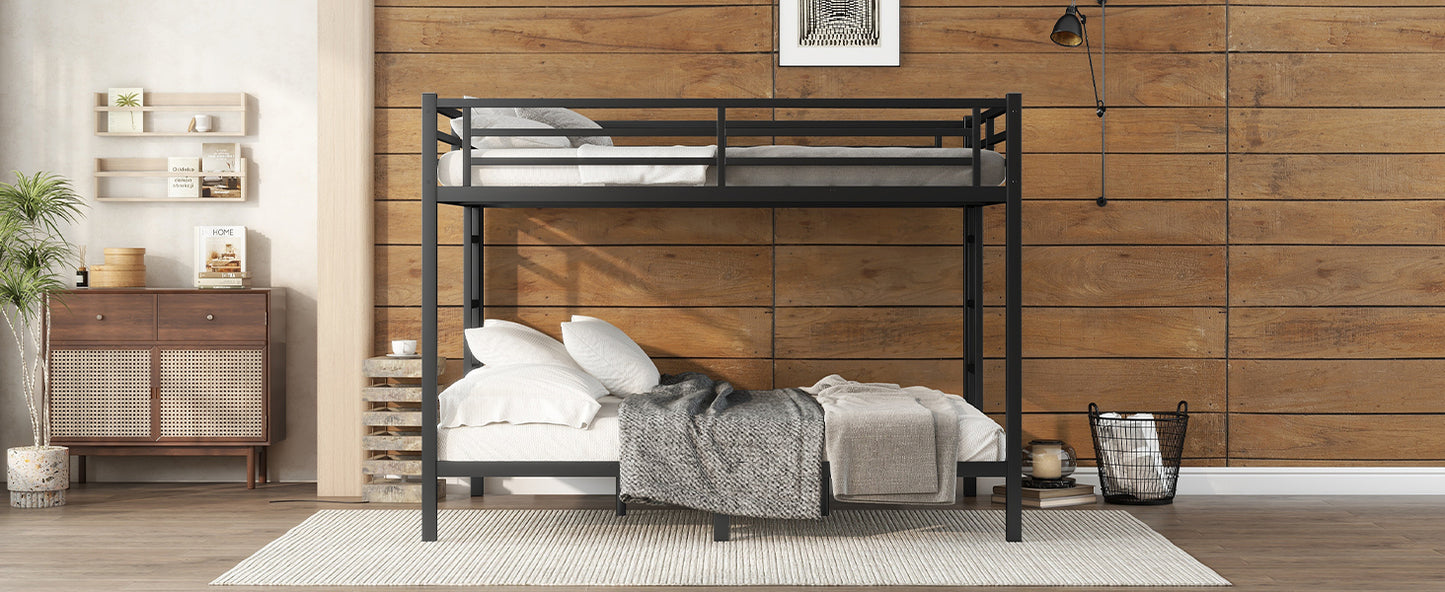 Black metal twin bunk bed with white bedding