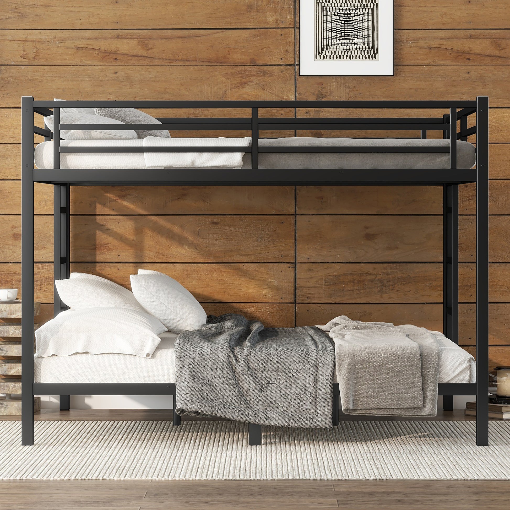 Black metal bunk bed with white and gray bedding