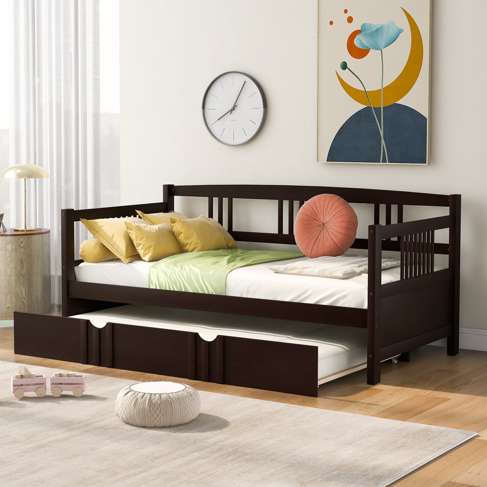 Dark brown wooden daybed with trundle featuring slatted sides and a comfortable mattress for small spaces