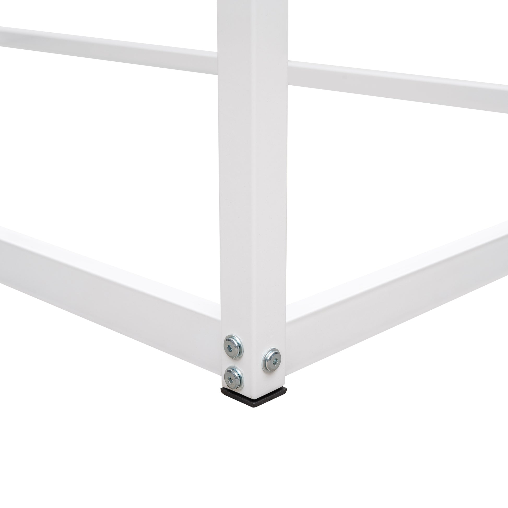 White metal bed frame corner detail with black foot pad