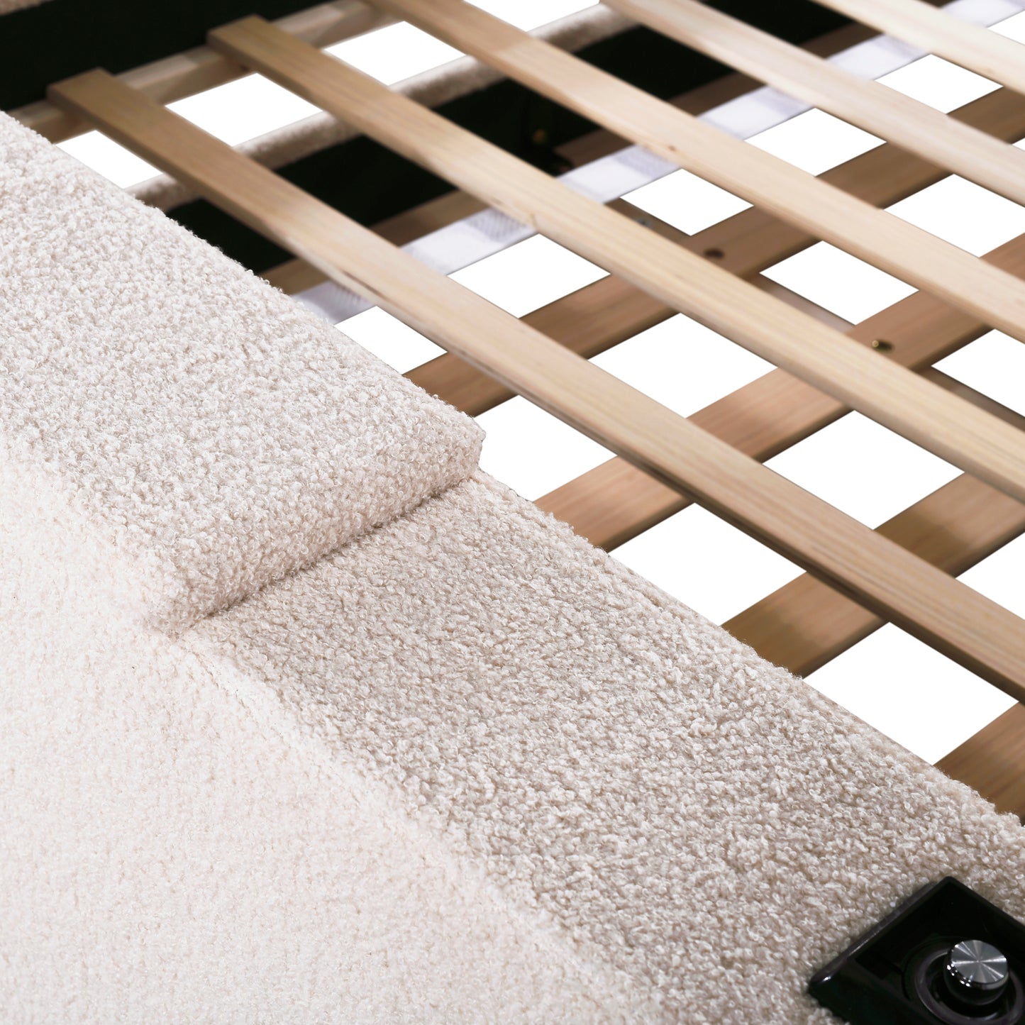 Cream textured fabric headboard with wooden slatted bed frame