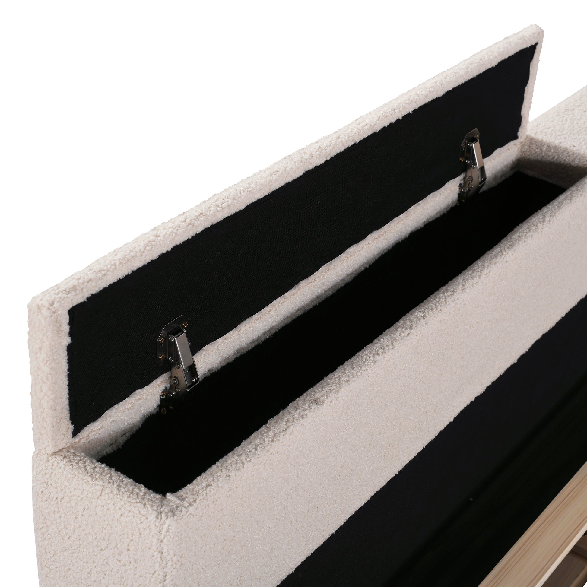 Cream boucle storage ottoman with open lid and visible interior compartment