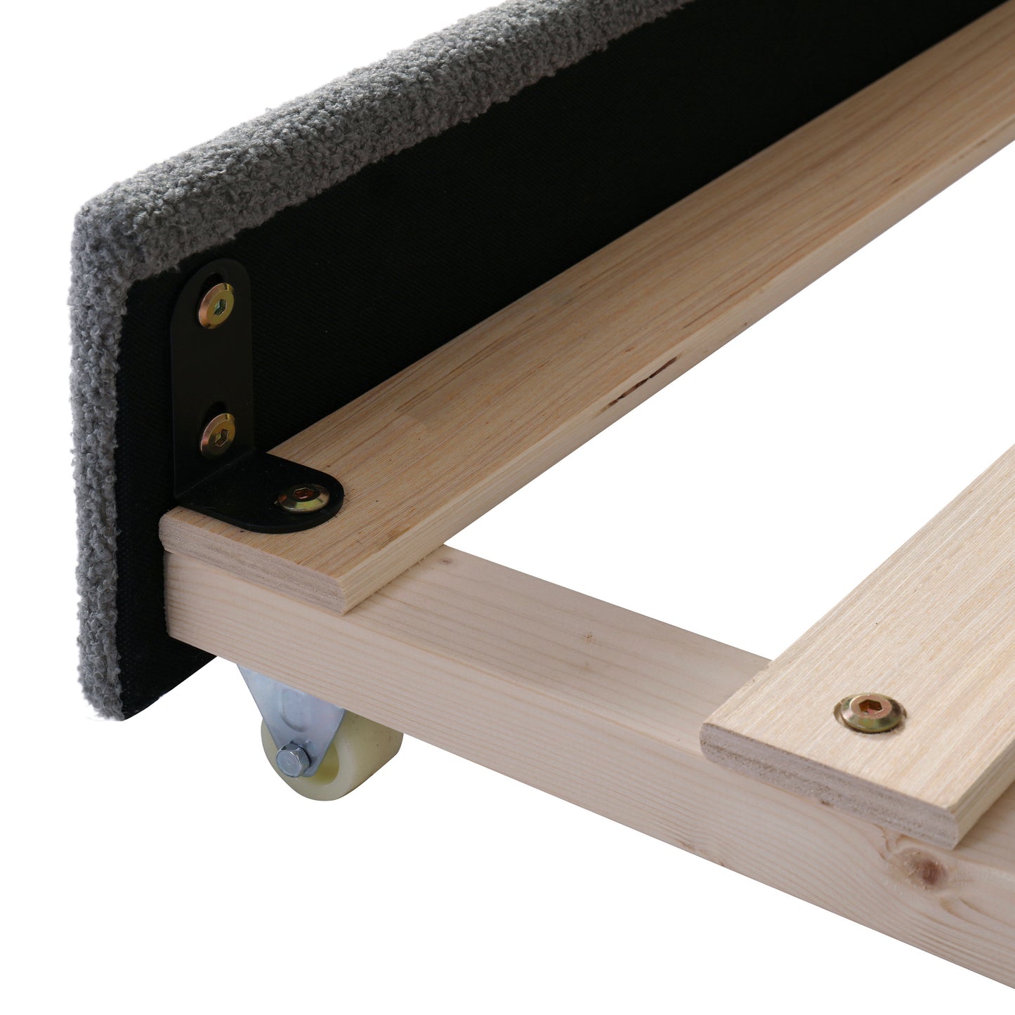 Closeup of gray upholstered bed frame edge with metal bracket and wheel