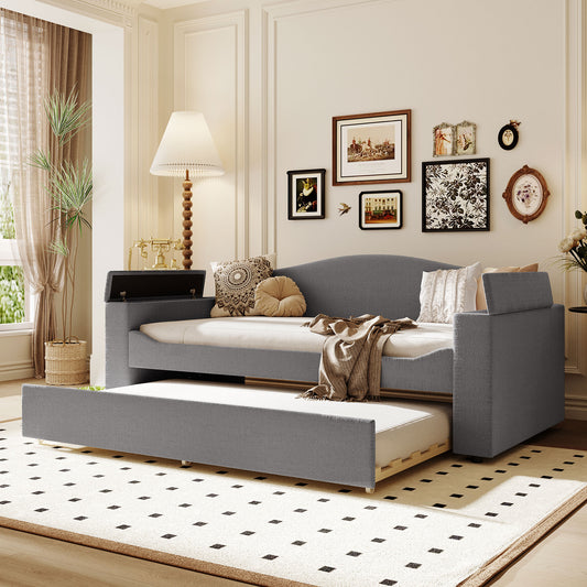 Grey fabric daybed with pullout trundle and storage chaise