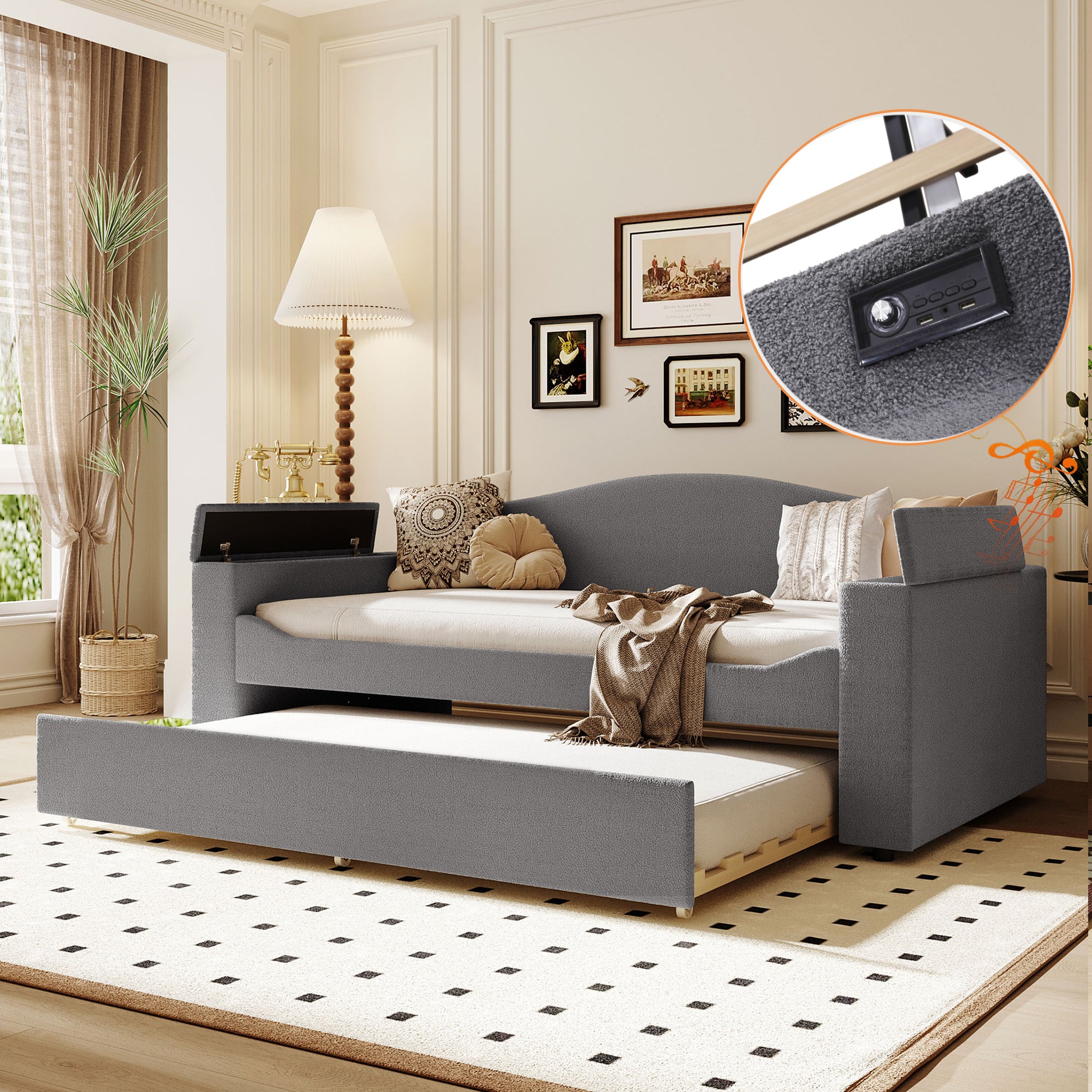 Gray upholstered daybed with pullout trundle and builtin storage