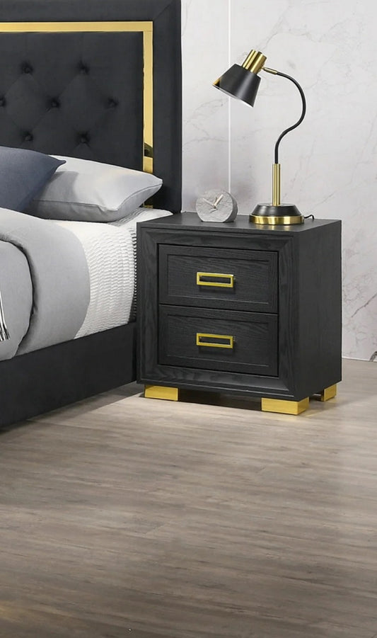 Black wood nightstand with two drawers and gold hardware