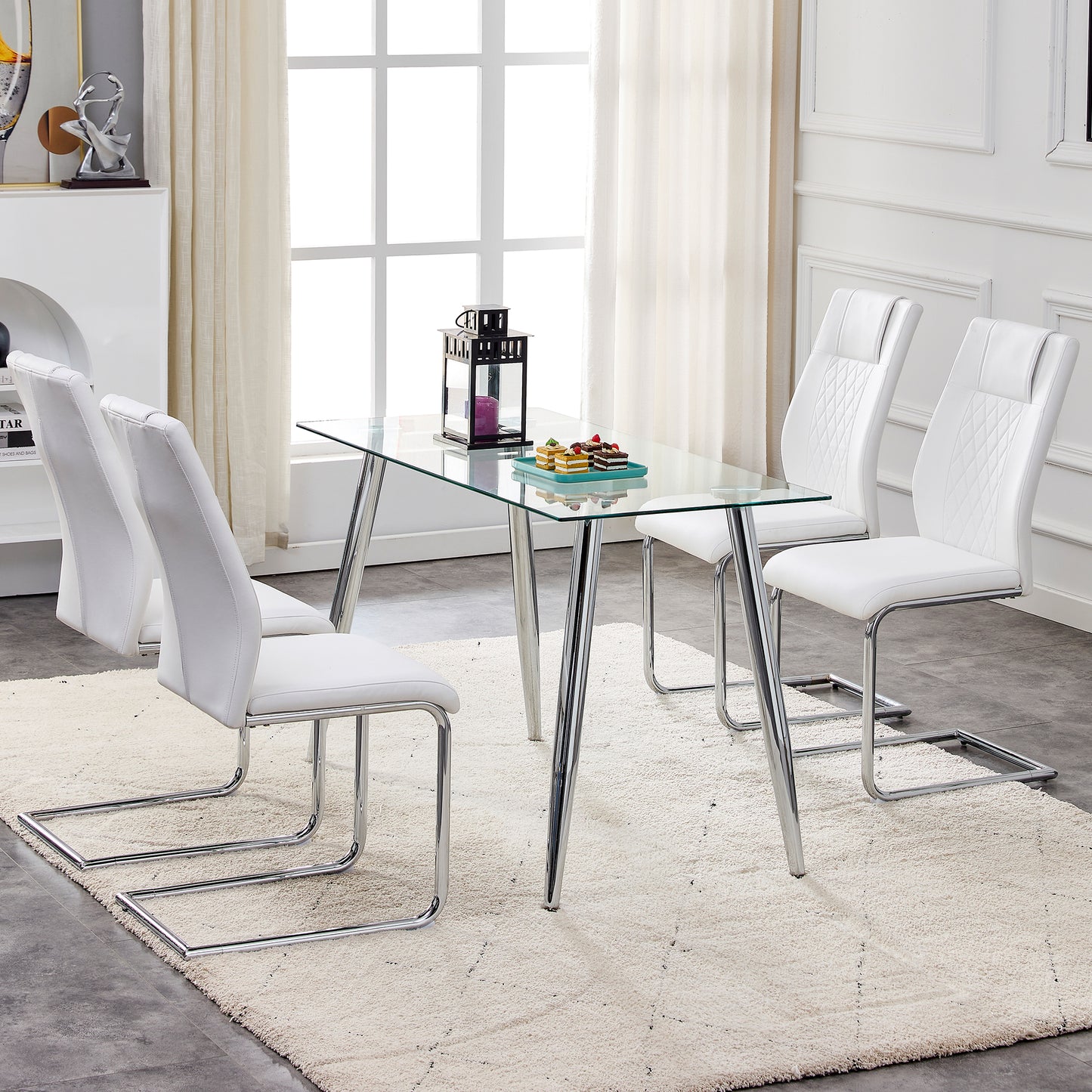White faux leather dining chairs with diamond stitching and chrome legs
