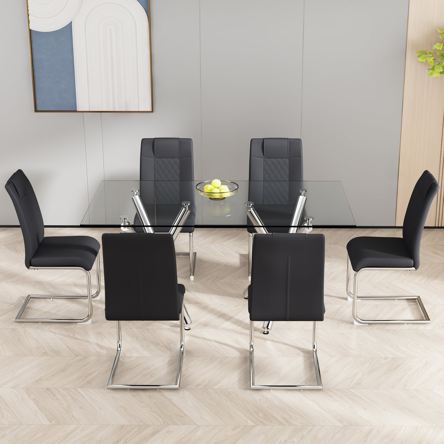Modern glass dining table with six black upholstered chairs and chrome legs