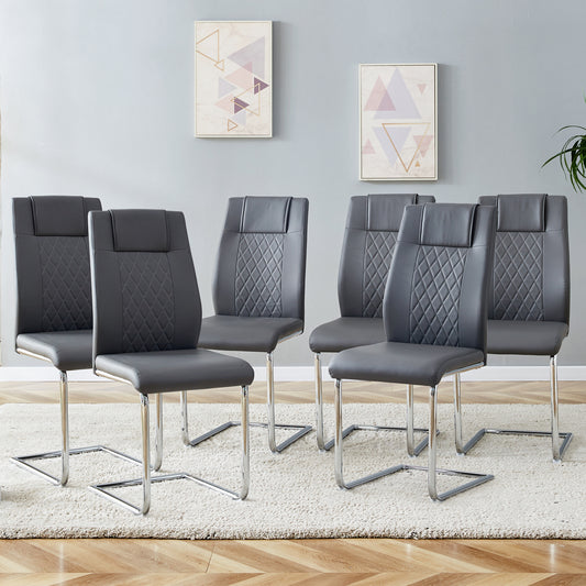 Set of  dark grey faux leather dining chairs with diamond stitching