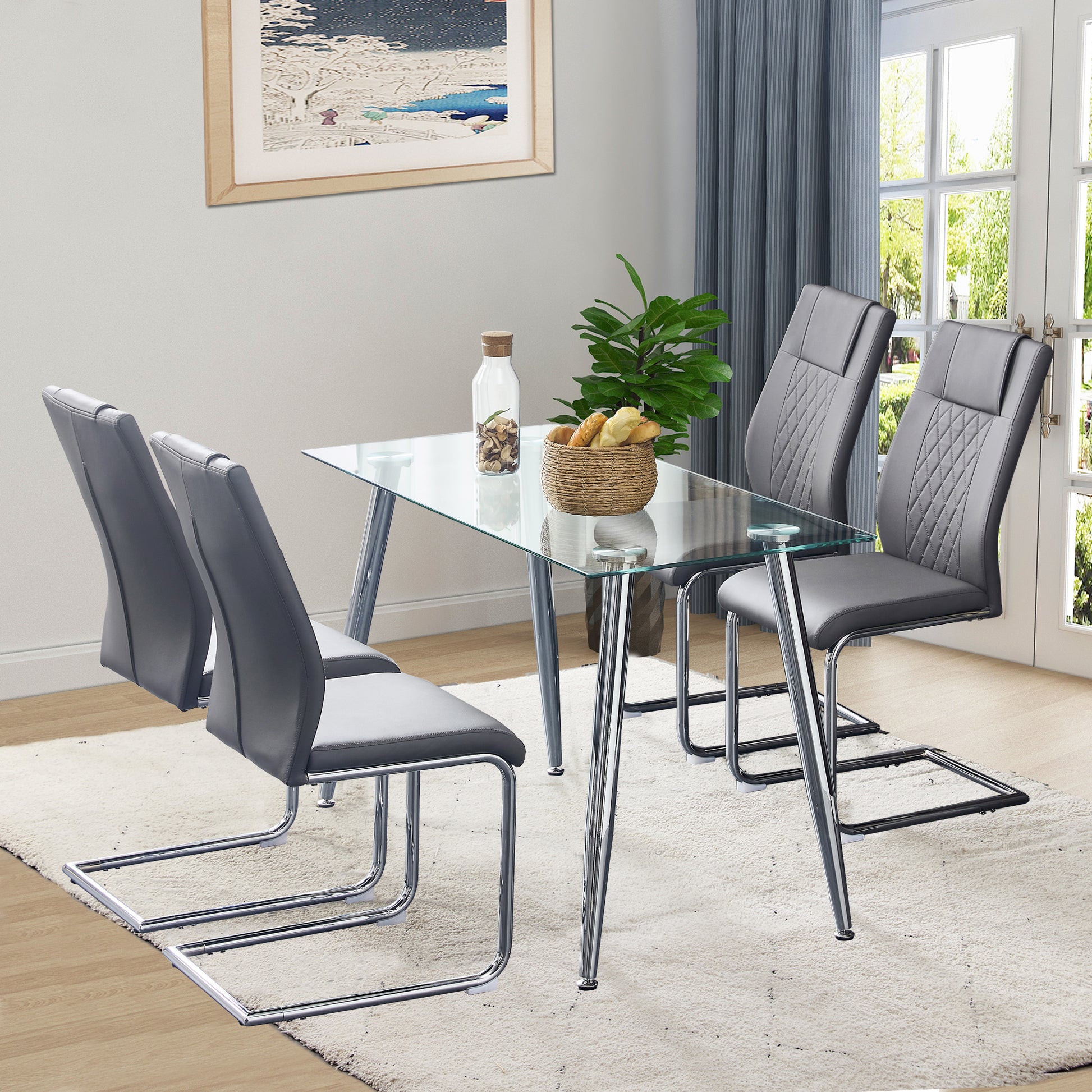 Set of  modern grey faux leather dining chairs with chrome sled legs