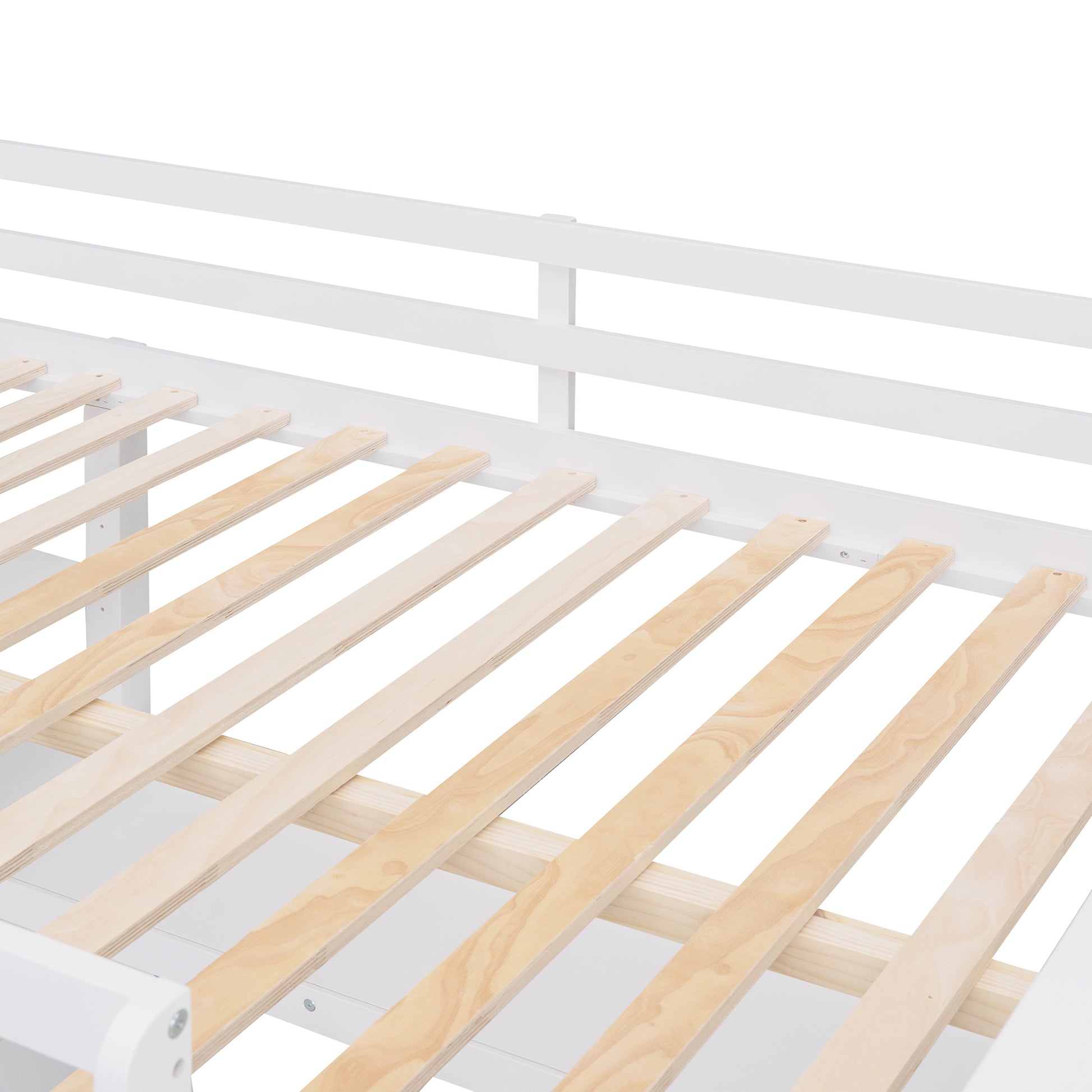 Closeup of white twin bed frame showing sturdy wooden slats for mattress support