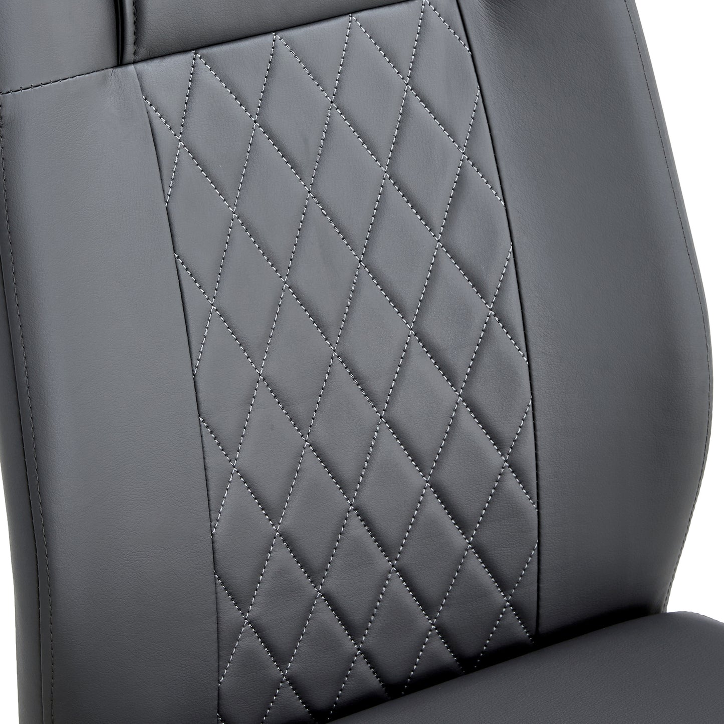 Closeup of grey faux leather car seat upholstery with diamond stitching
