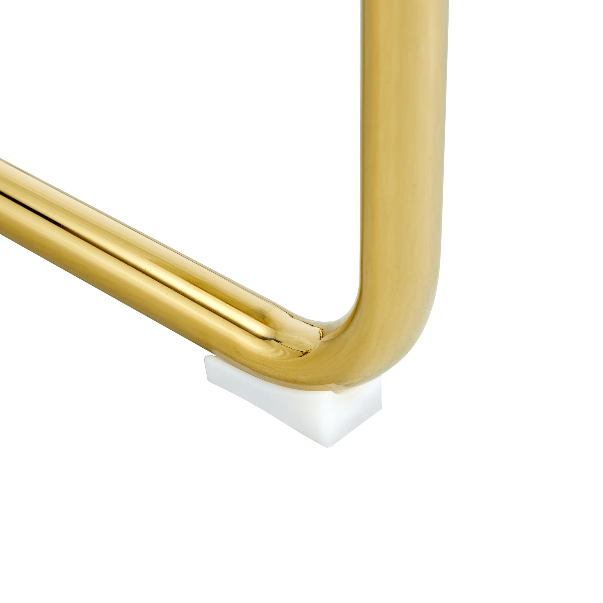 Gold metal furniture leg with white floor protector