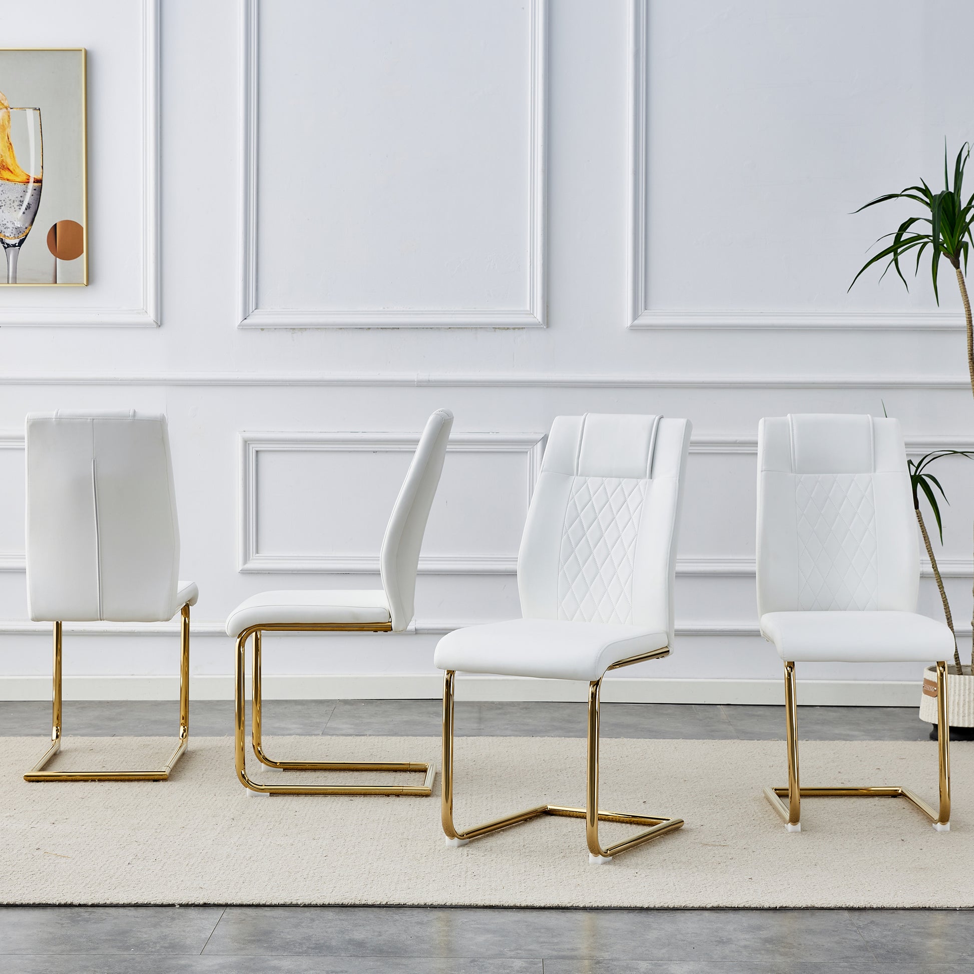 White faux leather dining chair with diamond stitching and gold frame