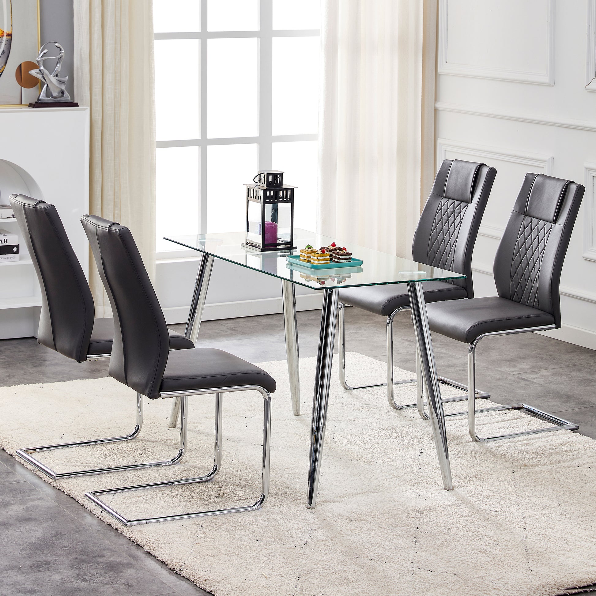 Modern grey faux leather dining chairs with diamond stitching
