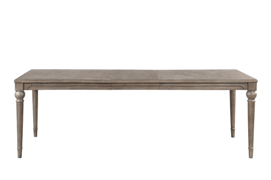 Weathered gray wood dining table with carved legs