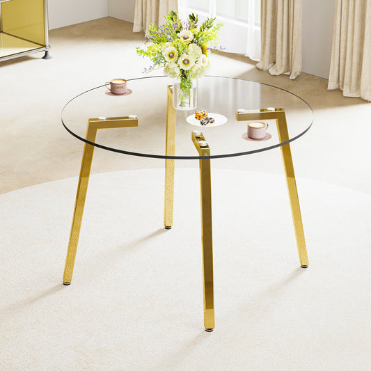 Round glass coffee table with gold metal legs