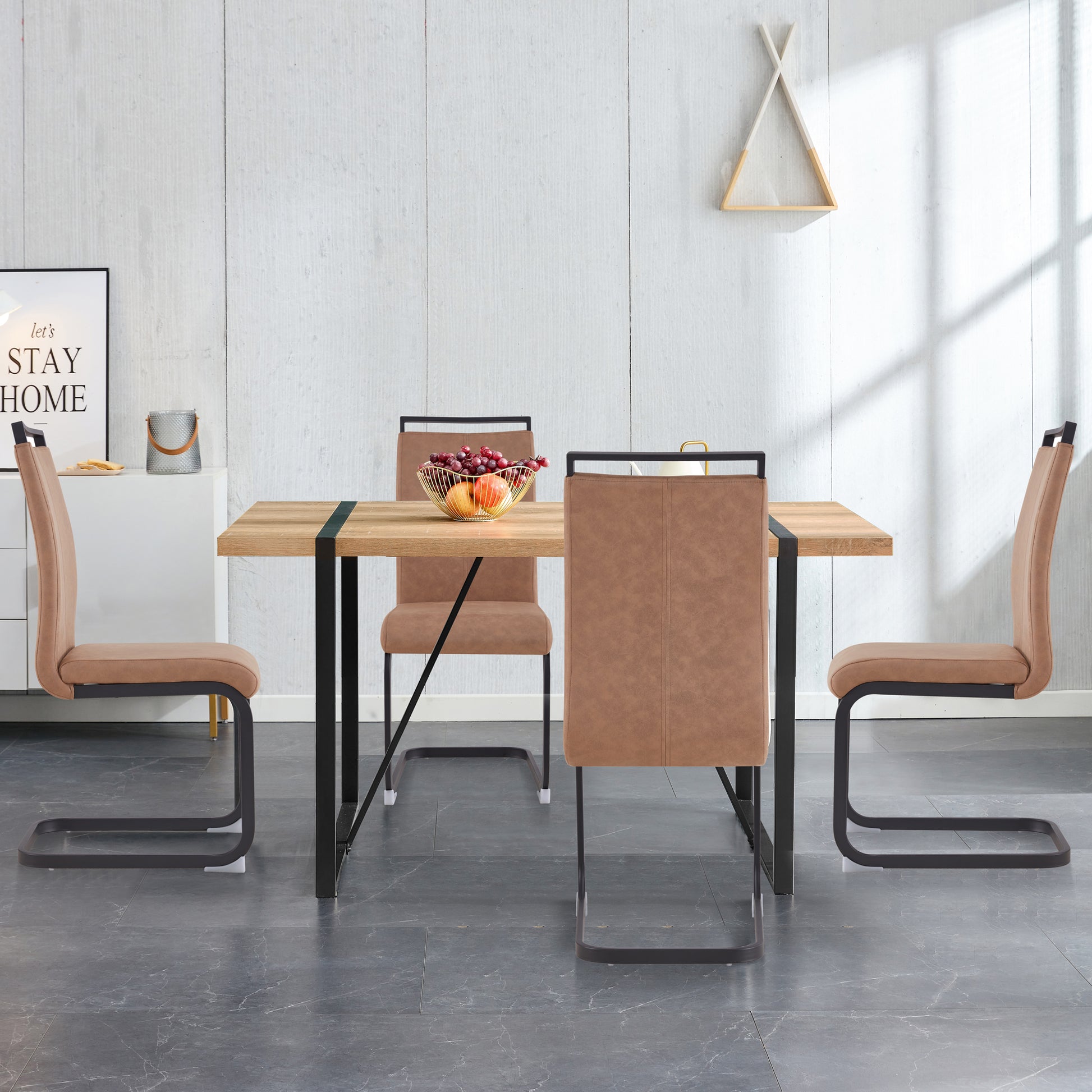 Modern dining set with tan faux leather chairs and woodgrain tabletop