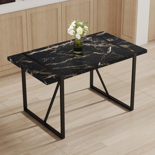 Black marble dining table with gold veining and black metal legs