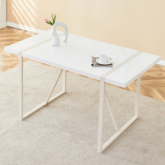 Sleek white modern dining table with matte cream legs perfect for contemporary homes