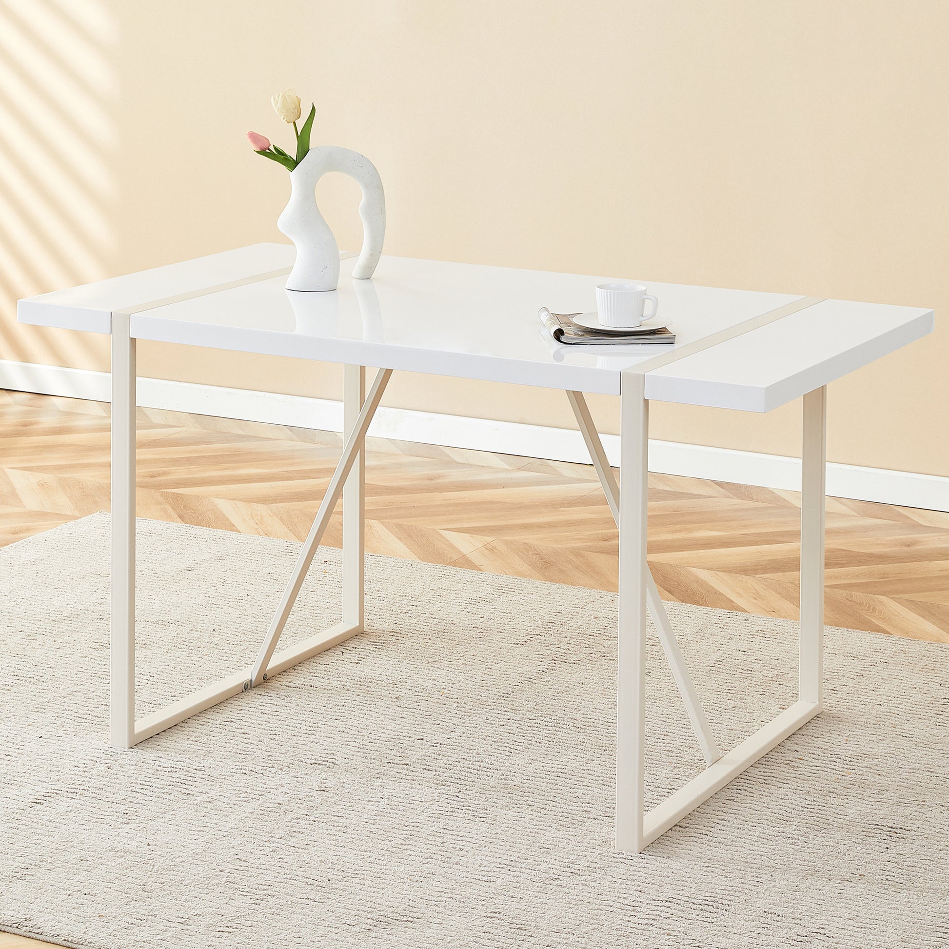 Modern white highgloss dining table with slim metal legs