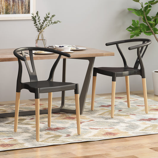 Black wishbone dining chair with natural wood legs