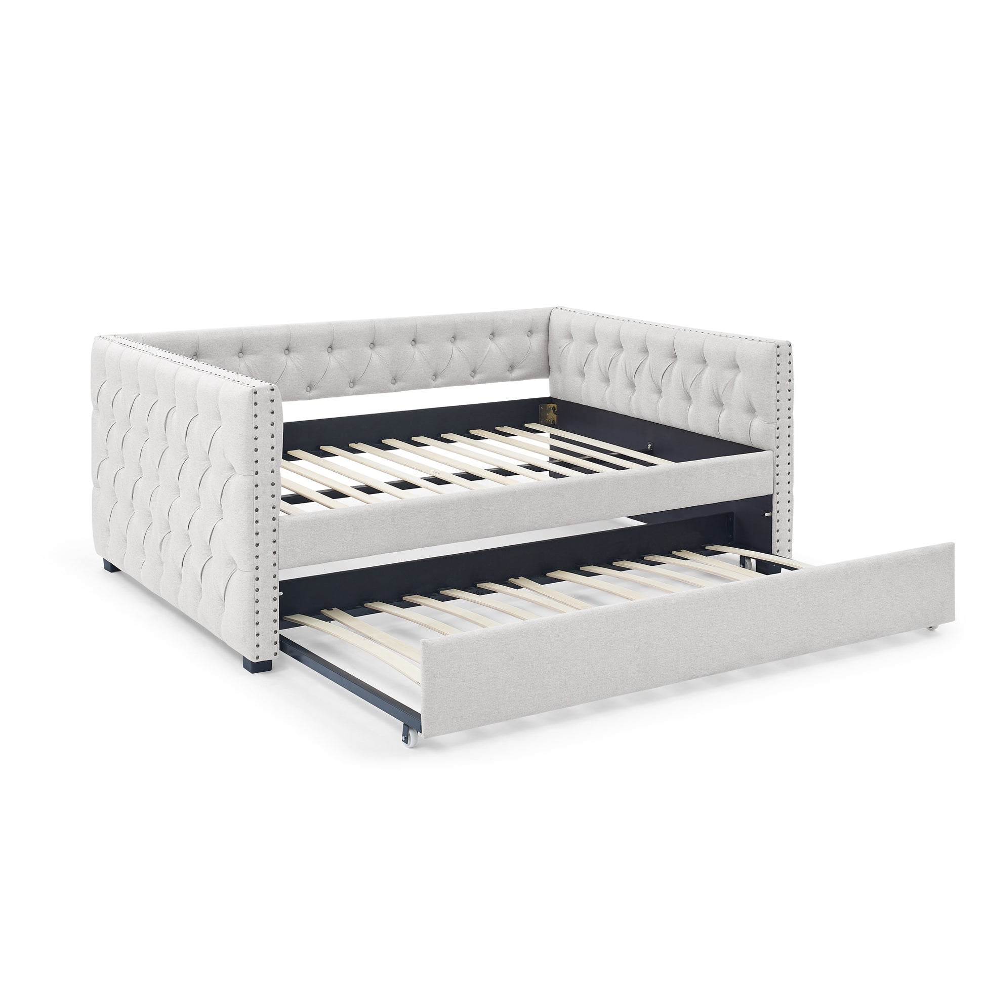 Light grey tufted daybed with pullout trundle perfect for guest rooms