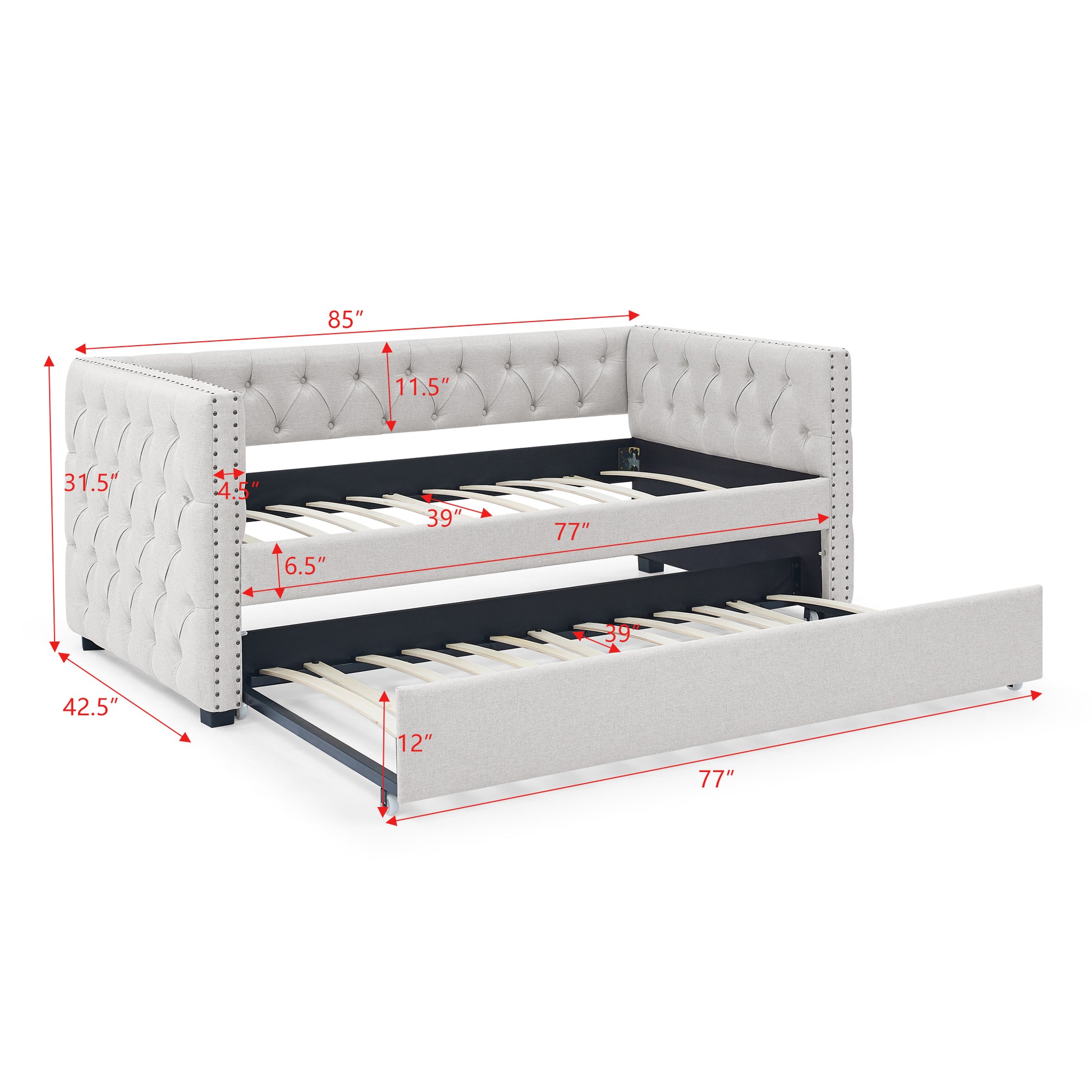 Tufted light grey upholstered daybed with a pullout trundle bed perfect for guest rooms