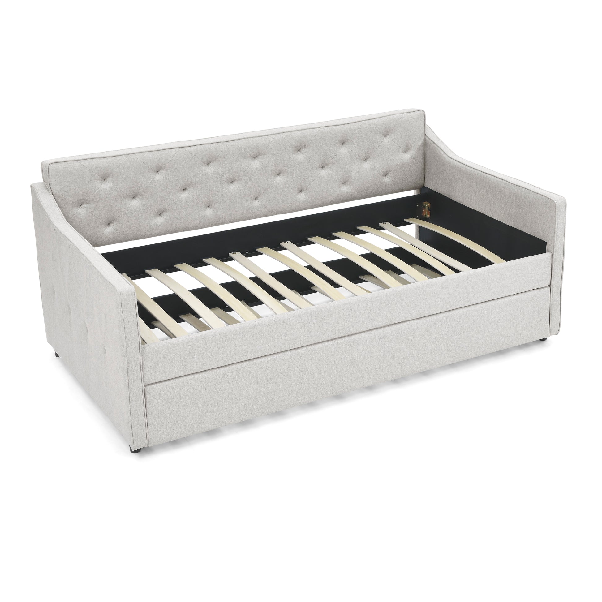 Light grey upholstered daybed with tufted back and wooden slat support