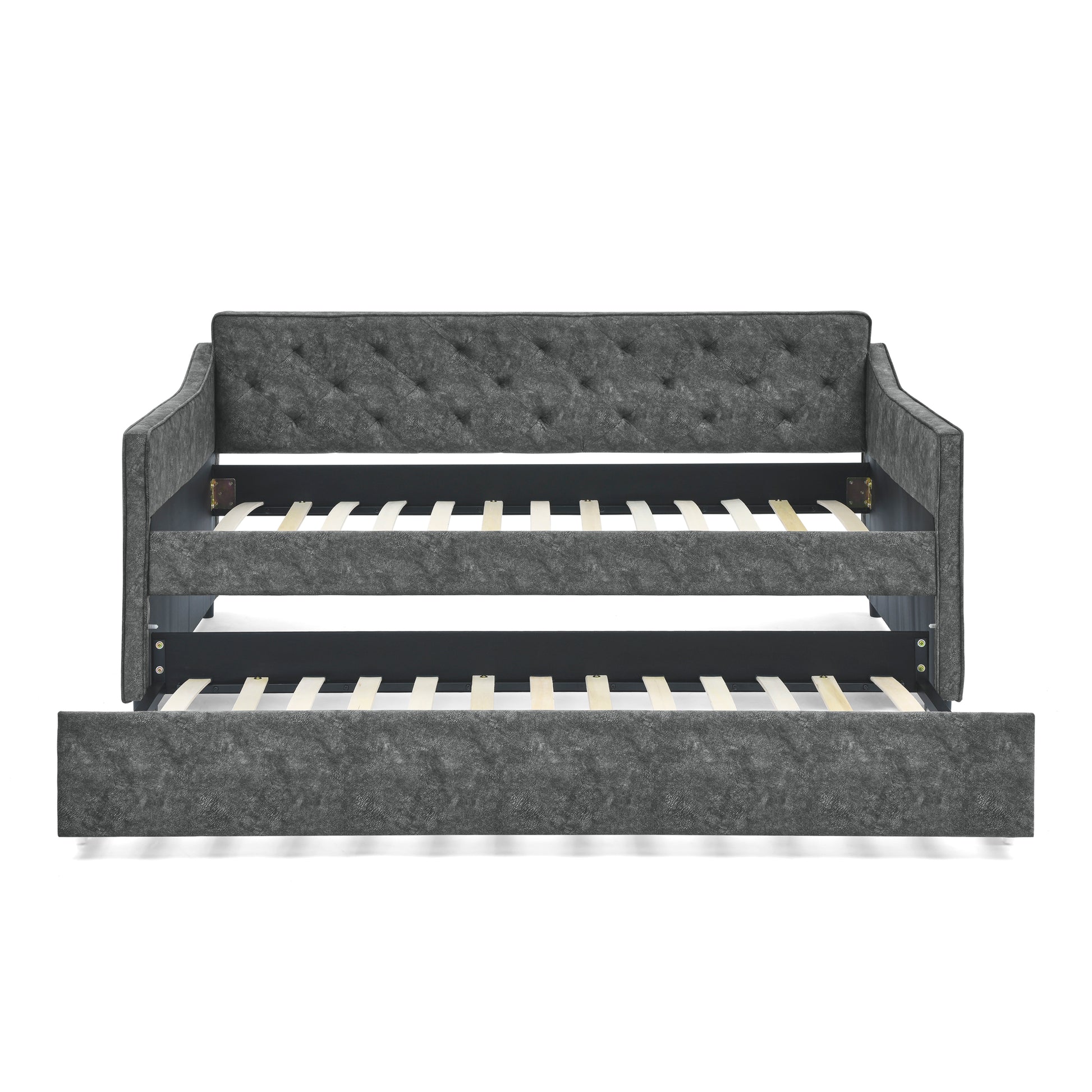 Tufted charcoal gray fabric daybed with pullout trundle and slatted support for twin mattresses