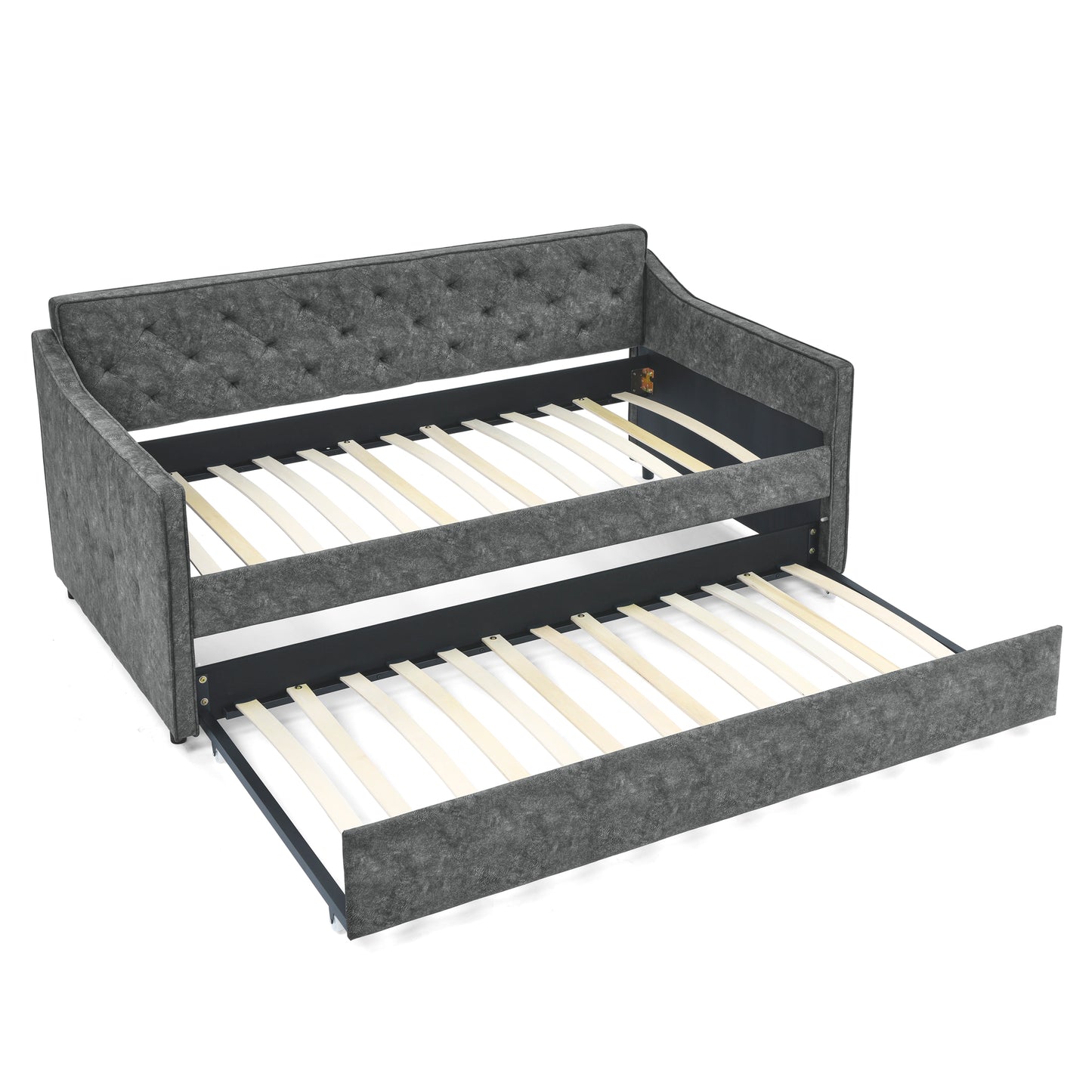 Dark gray upholstered daybed with pullout trundle and tufted backrest