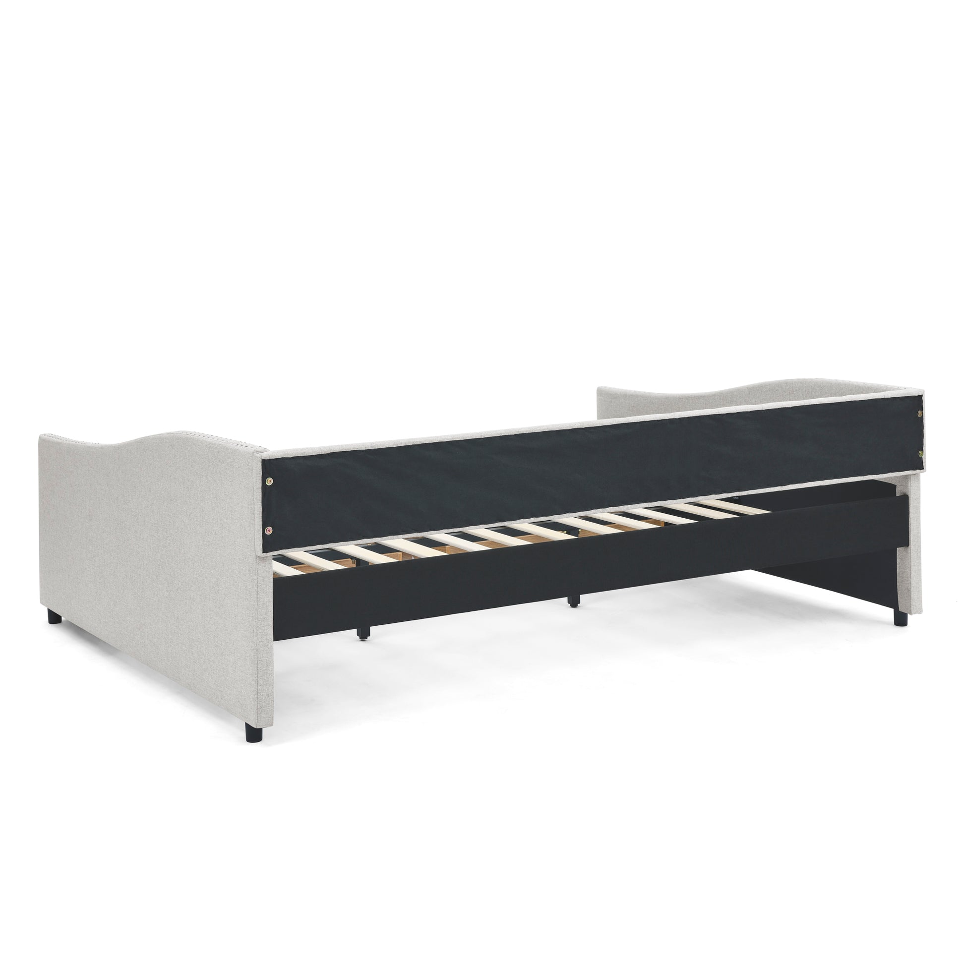 Light gray upholstered daybed with a curvaceous headboard and visible wooden slats ideal for a modern bedroom